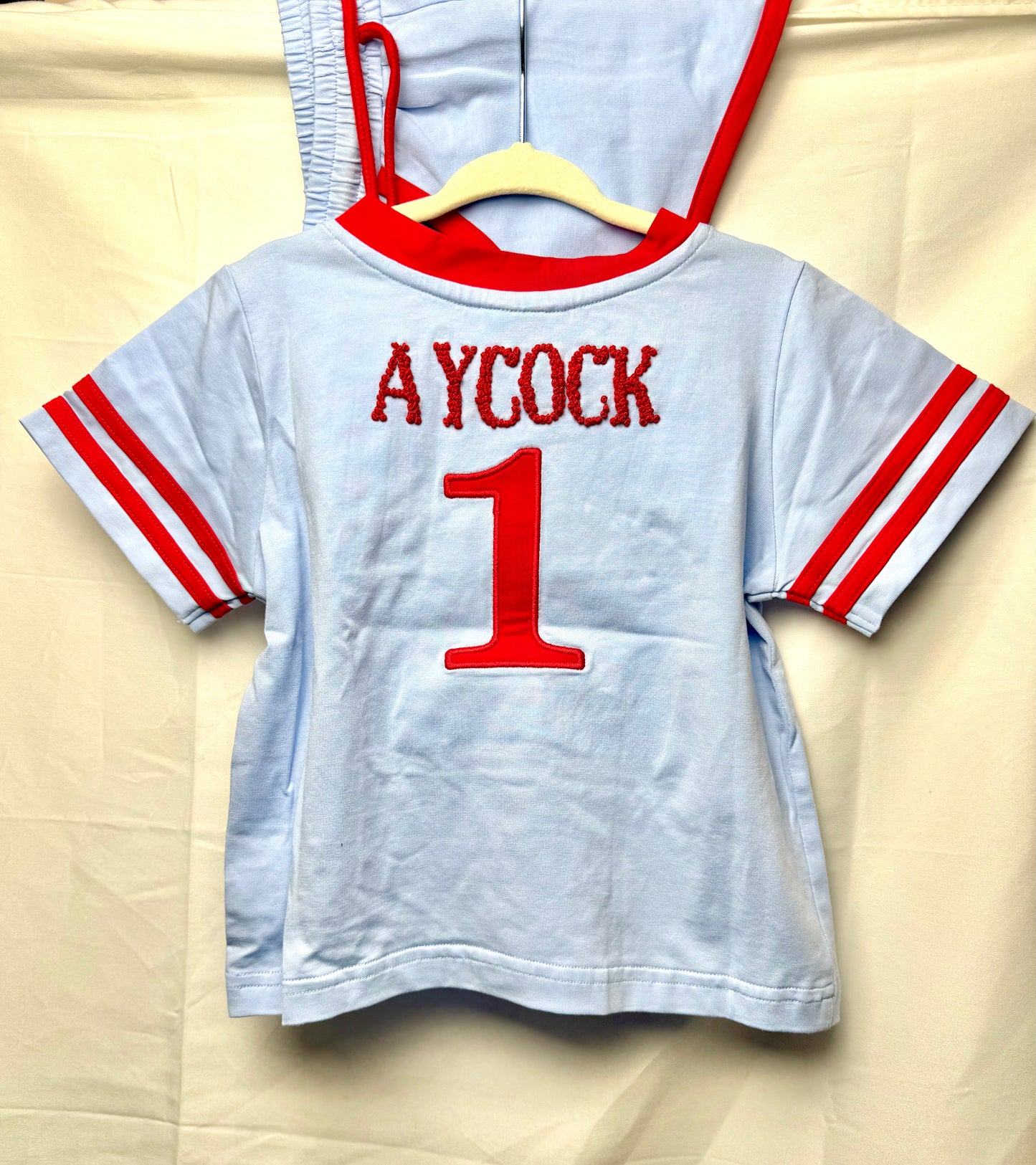 PO23: Powder Blue & Red Jerseys: Shorts Set